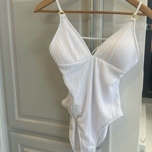 Becca white one piece